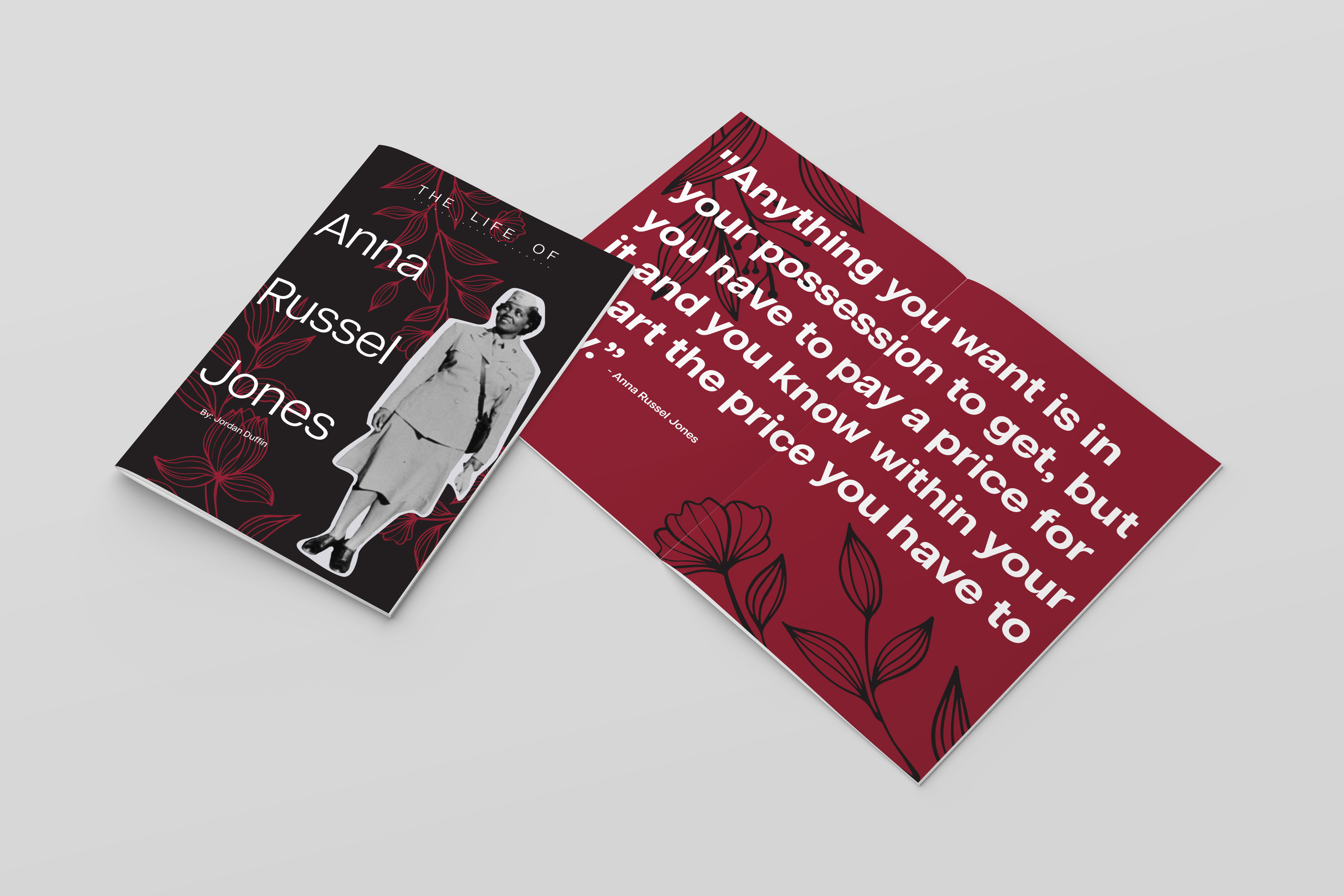 A display of a booklet laid out with a red, black, and white color scheme.